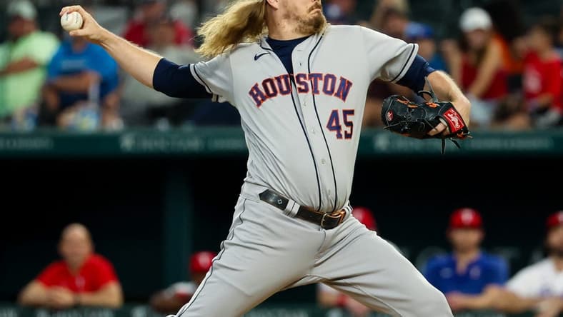Sep 4, 2023; Arlington, Texas, USA; Houston Astros relief pitcher Ryne Stanek (45) throws during the ninth inning against the Texas Rangers at Globe Life Field. Mandatory Credit: Kevin Jairaj-USA TODAY Sports