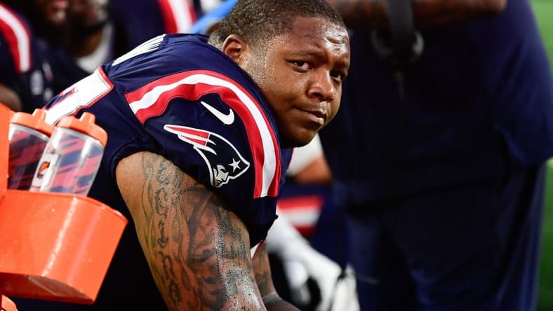 Sep 10, 2023; Foxborough, Massachusetts, USA; New England Patriots offensive tackle Trent Brown (77) sits on the bench during the second half against the Philadelphia Eagles at Gillette Stadium. Mandatory Credit: Eric Canha-USA TODAY Sports