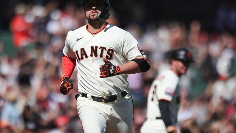 Sep 13, 2023; San Francisco, California, USA; San Francisco Giants third baseman J.D. Davis (7) reacts after hitting a three run home run during the eighth inning against the Cleveland Guardians at Oracle Park. Mandatory Credit: Sergio Estrada-USA TODAY Sports