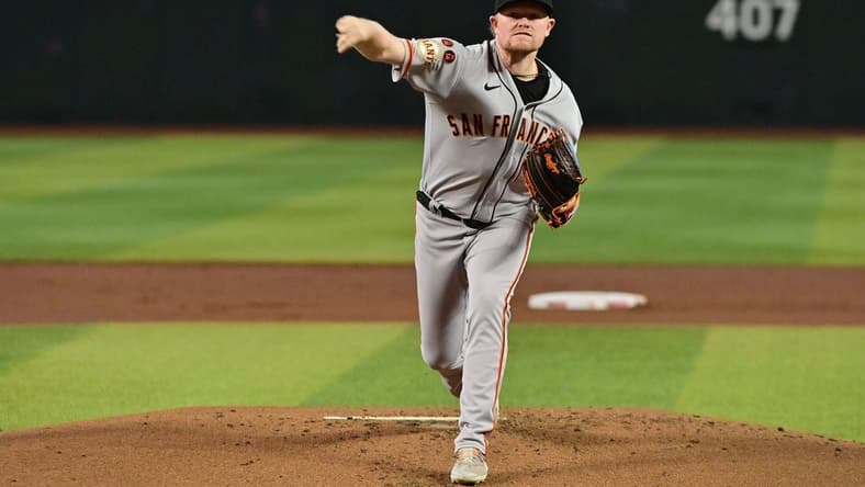 Sep 20, 2023; Phoenix, Arizona, USA;  San Francisco Giants starting pitcher Logan Webb (62) throws in the first inning against the Arizona Diamondbacks at Chase Field. Mandatory Credit: Matt Kartozian-USA TODAY Sports