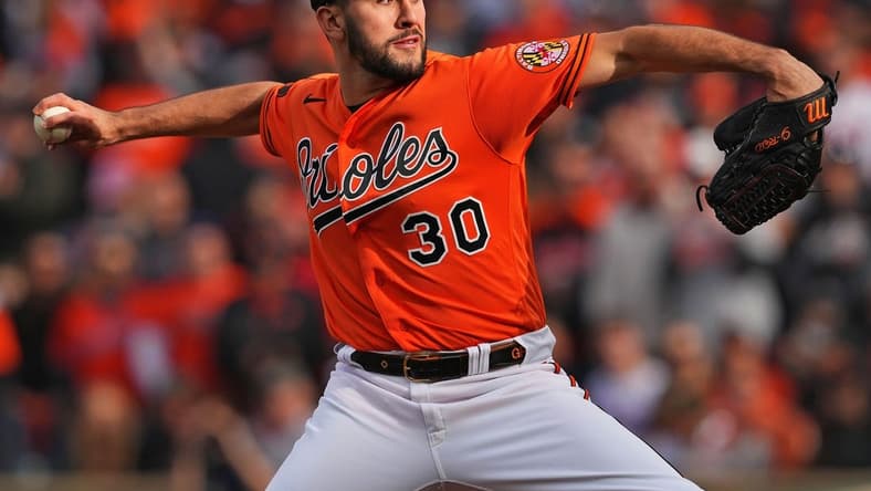 Oct 8, 2023; Baltimore, Maryland, USA; Baltimore Orioles starting pitcher Grayson Rodriguez (30) pitches during the first inning against the Texas Rangers during game two of the ALDS for the 2023 MLB playoffs at Oriole Park at Camden Yards. Mandatory Credit: Mitch Stringer-USA TODAY Sports