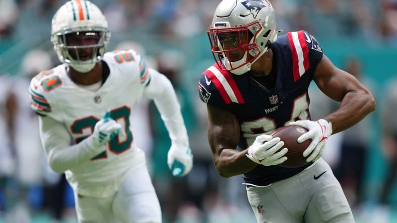 Oct 29, 2023; Miami Gardens, Florida, USA; New England Patriots wide receiver Kendrick Bourne (84) runs the ball for a touchdown against the Miami Dolphins during the first half at Hard Rock Stadium. Mandatory Credit: Jasen Vinlove-USA TODAY Sports