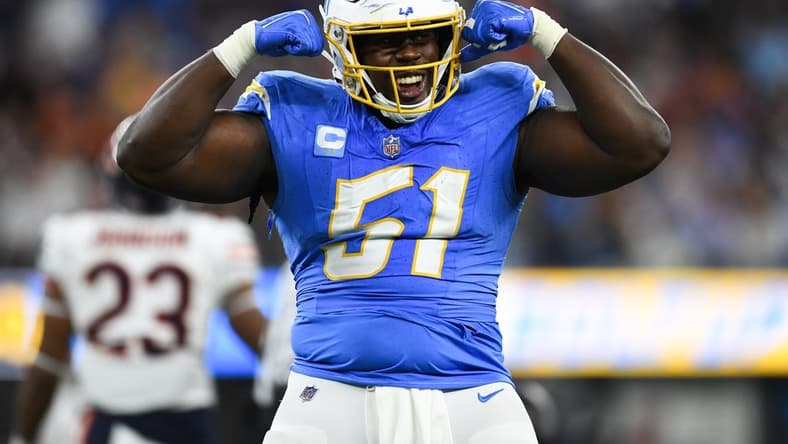 Oct 29, 2023; Inglewood, California, USA; Los Angeles Chargers defensive tackle Sebastian Joseph-Day (51) celebrates after a fourth down stop against the Chicago Bears during third quarter at SoFi Stadium. Mandatory Credit: Jonathan Hui-USA TODAY Sports