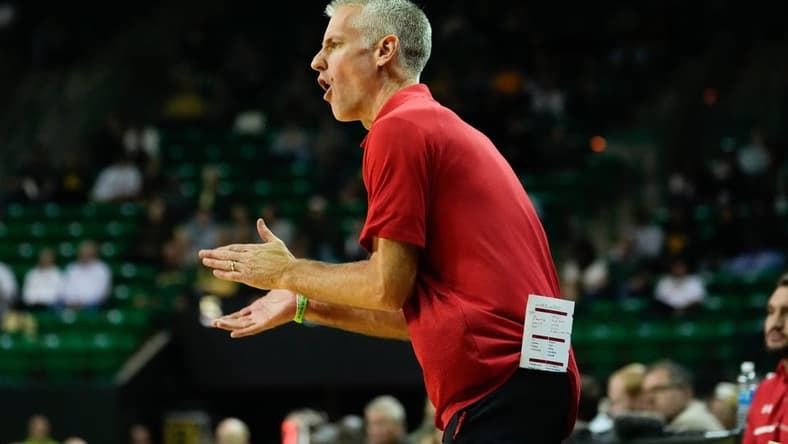 Nov 12, 2023; Waco, Texas, USA; Gardner Webb Runnin Bulldogs head coach Tim Craft reacts to a play against the Baylor Bears during the first half at Ferrell Center. Mandatory Credit: Chris Jones-USA TODAY Sports
