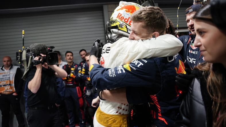 Nov 18, 2023; Las Vegas, Nevada, USA; Red Bull Racing Honda driver Max Verstappen of Netherlands (1) celebrates with his team after winning the Formula 1 Heineken Silver Las Vegas Grand Prix at the Las Vegas Strip Circuit. Mandatory Credit: Lucas Peltier-USA TODAY Sports