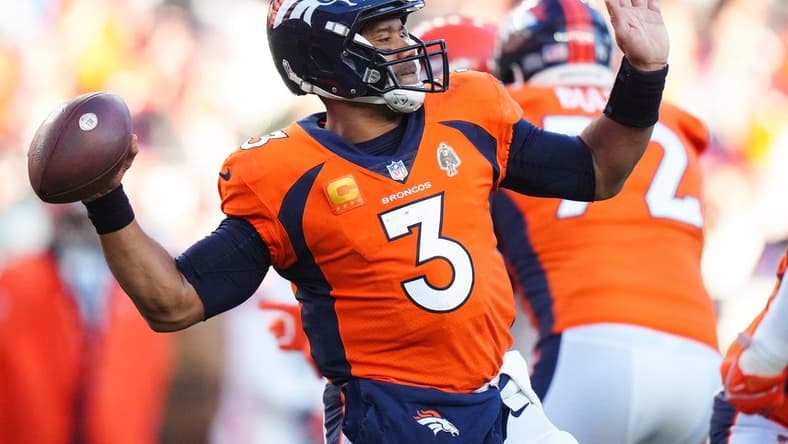 Nov 26, 2023; Denver, Colorado, USA; Denver Broncos quarterback Russell Wilson (3) throws the ball in the second quarter against the Cleveland Browns at Empower Field at Mile High. Mandatory Credit: Ron Chenoy-USA TODAY Sports