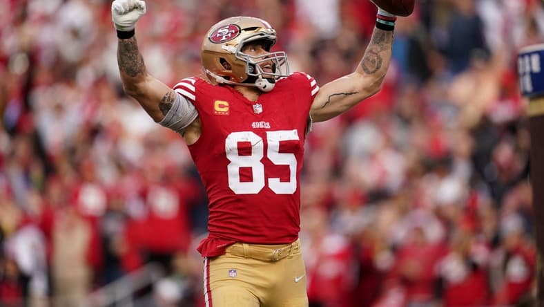 Dec 10, 2023; Santa Clara, California, USA; San Francisco 49ers tight end George Kittle (85) celebrates after scoring a touchdown against the Seattle Seahawks in the fourth quarter at Levi's Stadium. Mandatory Credit: Cary Edmondson-USA TODAY Sports