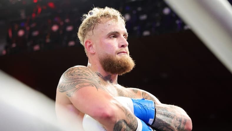 Dec 15, 2023; Orlando, Florida, USA;  Jake Paul reacts after knocking out Andre August in the first round at Caribe Royale Orlando. Mandatory Credit: Nathan Ray Seebeck-USA TODAY Sports