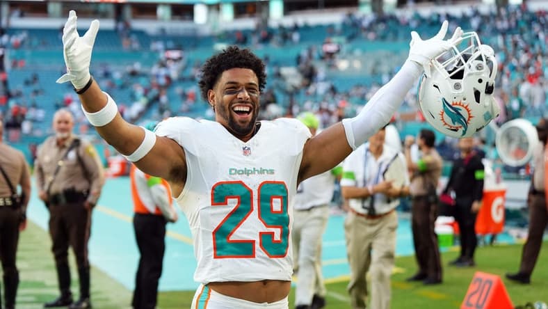 Dec 17, 2023; Miami Gardens, Florida, USA; Miami Dolphins safety Brandon Jones (29) celebrates after defeating the New York Jets at Hard Rock Stadium. Mandatory Credit: Jasen Vinlove-USA TODAY Sports