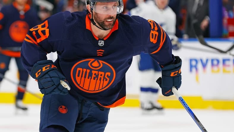 Dec 14, 2023; Edmonton, Alberta, CAN; Edmonton Oilers forward Sam Gagner (89) chases a loose puck against the Tampa Bay Lightning at Rogers Place. Mandatory Credit: Perry Nelson-USA TODAY Sports