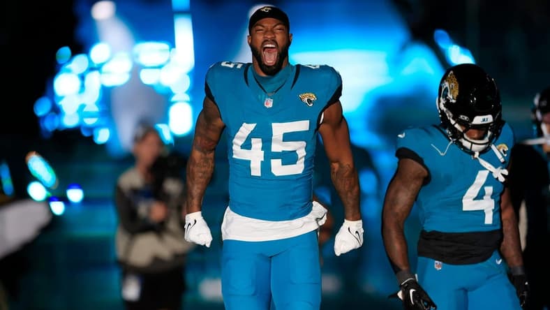 Jacksonville Jaguars linebacker K'Lavon Chaisson (45) yells during the team introduction before a regular season NFL football matchup Sunday, Dec. 17, 2023 at EverBank Stadium in Jacksonville, Fla. The Baltimore Ravens defeated the Jacksonville Jaguars 23-7.