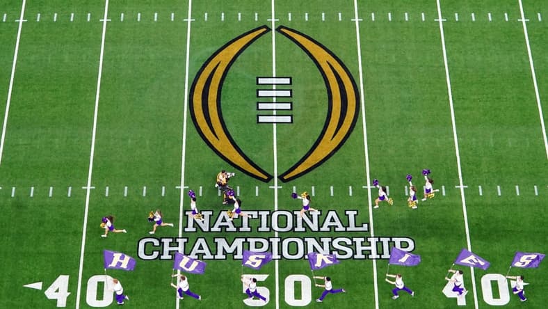 Jan 8, 2024; Houston, TX, USA; A general view as the Washington Huskies take the field before to the 2024 College Football Playoff national championship game at NRG Stadium. Mandatory Credit: James Lang-USA TODAY Sports