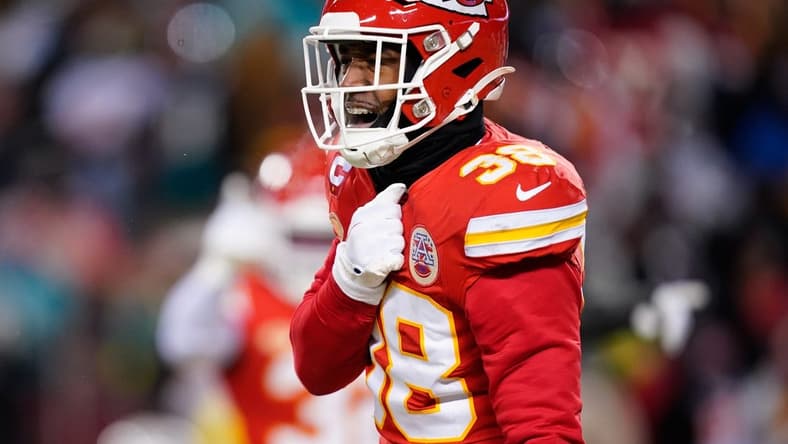 Jan 13, 2024; Kansas City, Missouri, USA; Kansas City Chiefs cornerback L'Jarius Sneed (38) reacts against the Miami Dolphins during the first half of the 2024 AFC wild card game at GEHA Field at Arrowhead Stadium. Mandatory Credit: Jay Biggerstaff-USA TODAY Sports