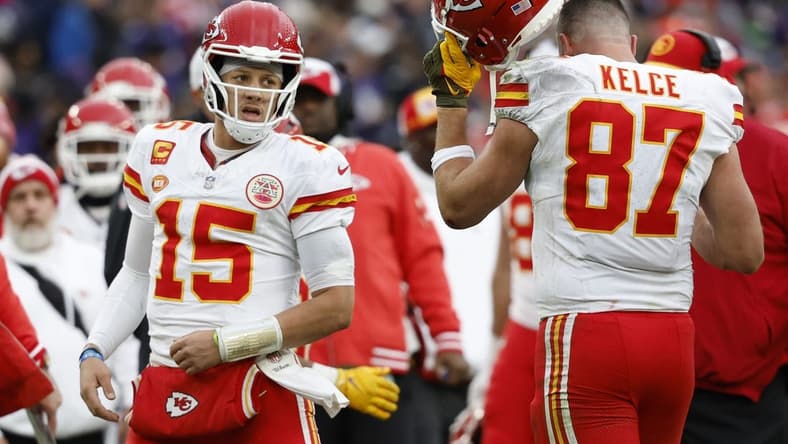 Jan 28, 2024; Baltimore, Maryland, USA; Kansas City Chiefs quarterback Patrick Mahomes (15) celebrates with Chiefs tight end Travis Kelce (87) after a touchdown against the Baltimore Ravens in the AFC Championship football game at M&T Bank Stadium. Mandatory Credit: Geoff Burke-USA TODAY Sports