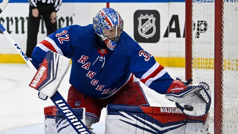 Feb 5, 2024; New York, New York, USA;  New York Rangers goaltender Jonathan Quick (32) makes a save against the Colorado Avalanche during the third period at Madison Square Garden. Mandatory Credit: Dennis Schneidler-USA TODAY Sports
