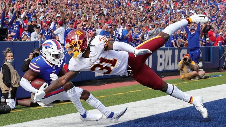 Bills receiver Emmanuel Sanders holds on to this pass behind Washington's Kamren Curl for a 5 yard touchdown.
