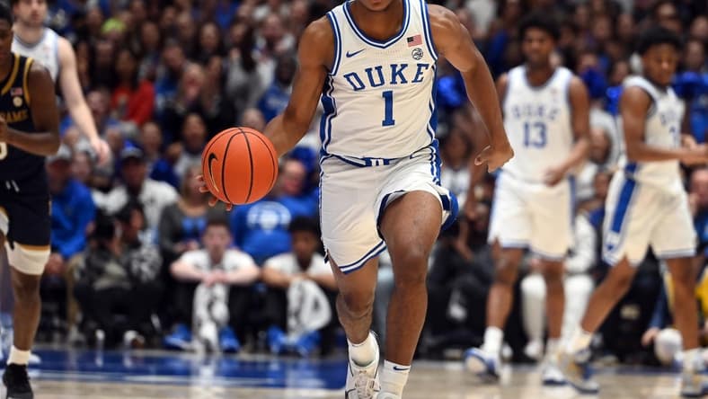 Feb 7, 2024; Durham, North Carolina, USA; Duke Blue Devils guard Caleb Foster (1) dribbles up court during the second half against the Notre Dame Fighting Irish at Cameron Indoor Stadium. The Blue Devils won 71-53.Mandatory Credit: Rob Kinnan-USA TODAY Sports