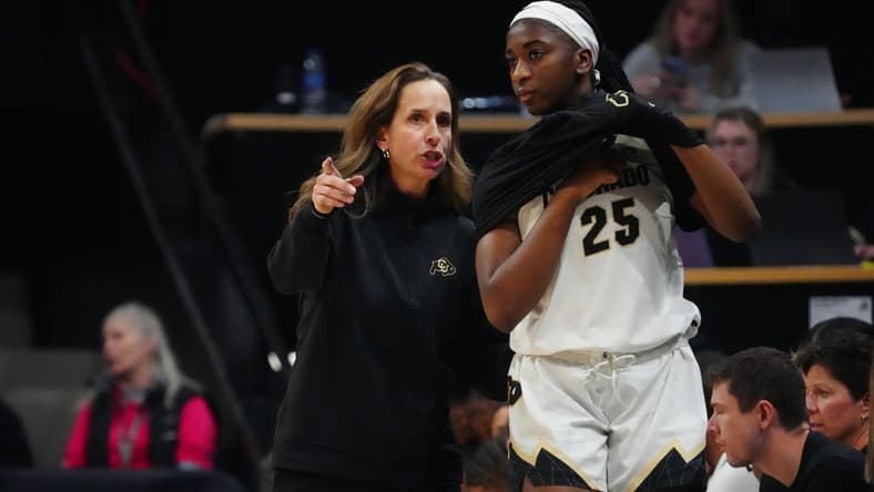 Feb 9, 2024; Boulder, Colorado, USA; Colorado Buffaloes head coach JR Payne talks to forward Brianna McLeod (25) in the second half against the Oregon Ducks at CU Events Center. Mandatory Credit: Ron Chenoy-USA TODAY Sports