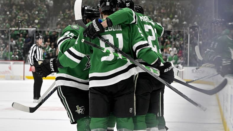 Feb 13, 2024; Dallas, Texas, USA; Dallas Stars center Matt Duchene (95) and center Tyler Seguin (91) and left wing Mason Marchment (27) celebrates a goal scored by Marchment against the Carolina Hurricanes during the second period at the American Airlines Center. Mandatory Credit: Jerome Miron-USA TODAY Sports