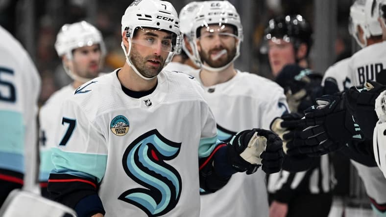 Feb 15, 2024; Boston, Massachusetts, USA; Seattle Kraken right wing Jordan Eberle (7) celebrates with his teammates after scoring a goal against the Boston Bruins during the first period at TD Garden. Mandatory Credit: Brian Fluharty-USA TODAY Sports