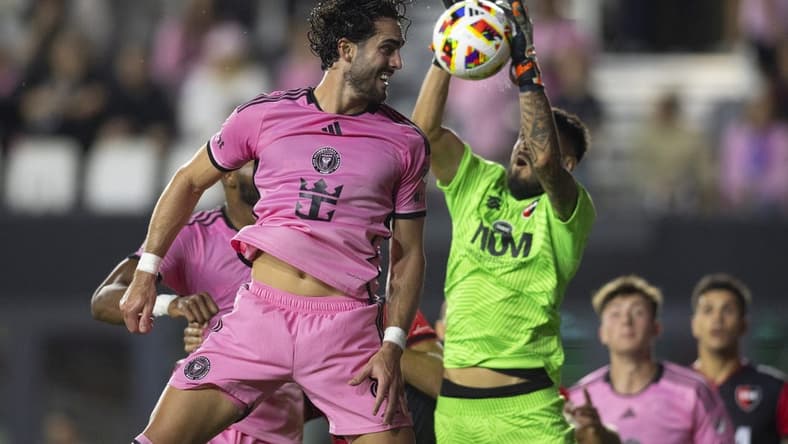 Feb 15, 2024; Fort Lauderdale, FL, USA; Inter Miami CF forward Leonardo Campana (8) attempts to connect a header against Newell   s Old Boys goalkeeper Lucas Hoyos (1) during the second half at DRV PNK Stadium. Mandatory Credit: Sam Navarro-USA TODAY Sports