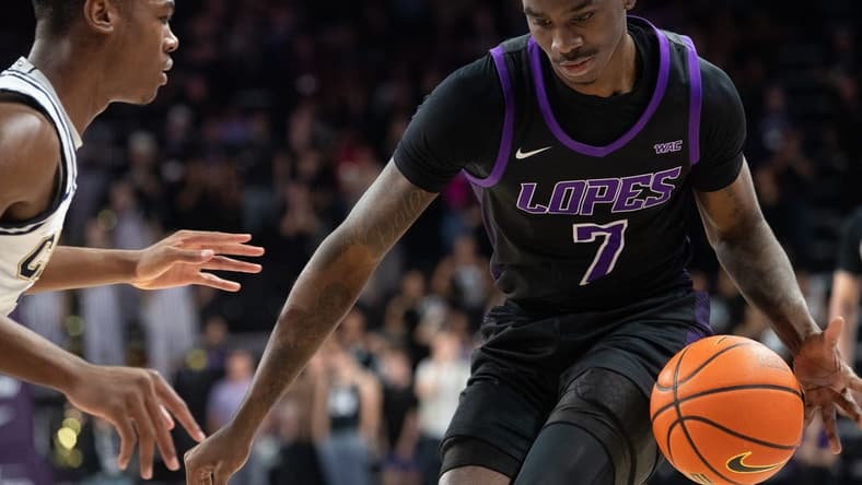 GCU guard Tyon Grant-Foster (7) dribbles the ball upcourt at Grand Canyon University Arena in Phoenix on Feb. 17, 2024.