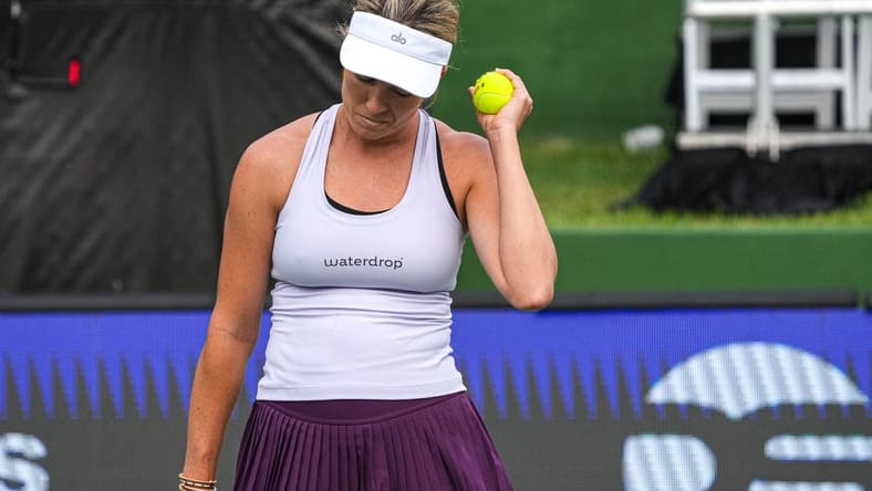 American Tennis Player Danielle Collins holds up a ball after scoring during her ATX Open Round 16 match against Caty McNally at the Westwood Country Club on Thursday, March. 2, 2023 in Austin.