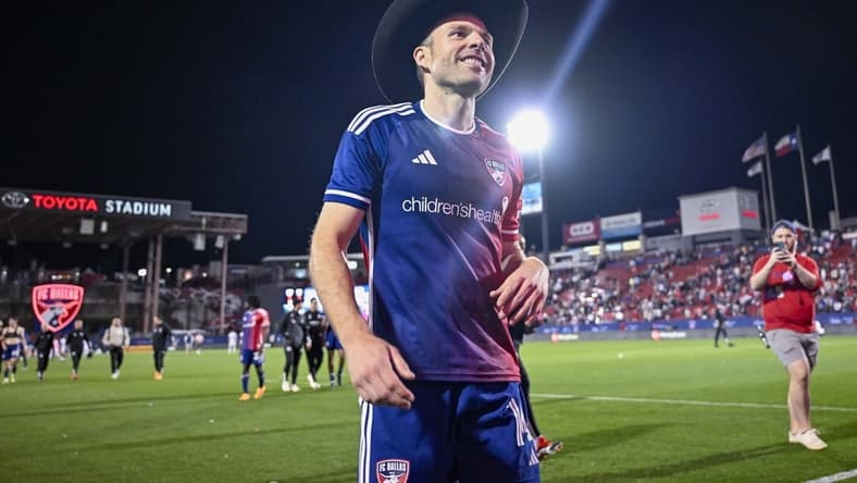 Feb 24, 2024; Frisco, Texas, USA; FC Dallas midfielder Asier Illarramendi (14) celebrates with the cowboy hat after FC Dallas defeats San Jose Earthquakes 2-1 at Toyota Stadium. Mandatory Credit: Jerome Miron-USA TODAY Sports