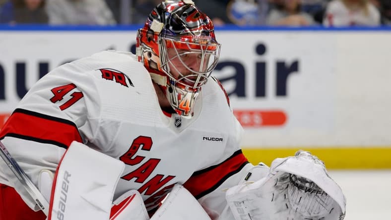 Feb 25, 2024; Buffalo, New York, USA;  Carolina Hurricanes goaltender Spencer Martin (41) looks to make a save during the second period against the Buffalo Sabres at KeyBank Center. Mandatory Credit: Timothy T. Ludwig-USA TODAY Sports