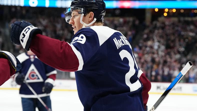 Feb 27, 2024; Denver, Colorado, USA;Colorado Avalanche center Nathan MacKinnon (29) celebrates his goal in the second period against the Dallas Stars at Ball Arena. Mandatory Credit: Ron Chenoy-USA TODAY Sports