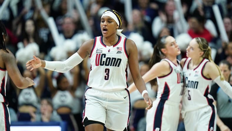 Feb 28, 2024; Storrs, Connecticut, USA; UConn Huskies forward Aaliyah Edwards (3) and teammates react during a timeout against the Villanova Wildcats in the second half at Harry A. Gampel Pavilion. Mandatory Credit: David Butler II-USA TODAY Sports