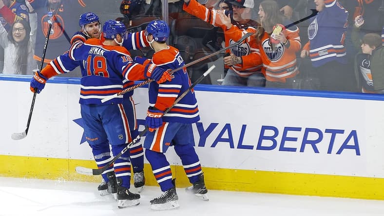 Feb 28, 2024; Edmonton, Alberta, CAN; The Edmonton Oilers celebrate a goal scored by forward Connor McDavid (97) during overtime against the St. Louis Blues at Rogers Place. Mandatory Credit: Perry Nelson-USA TODAY Sports