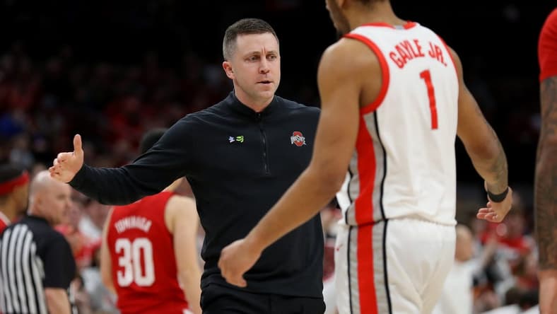 Feb 29, 2024; Columbus, Ohio, USA; Ohio State Buckeyes head coach Jake Diebler congratulates guard Roddy Gayle Jr. (1) during the first half against the Nebraska Cornhuskers at Value City Arena. Mandatory Credit: Joseph Maiorana-USA TODAY Sports