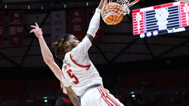 Feb 29, 2024; Salt Lake City, Utah, USA; Utah Utes guard Deivon Smith (5) dunks the ball against the Stanford Cardinal during the second half at Jon M. Huntsman Center. Mandatory Credit: Rob Gray-USA TODAY Sports
