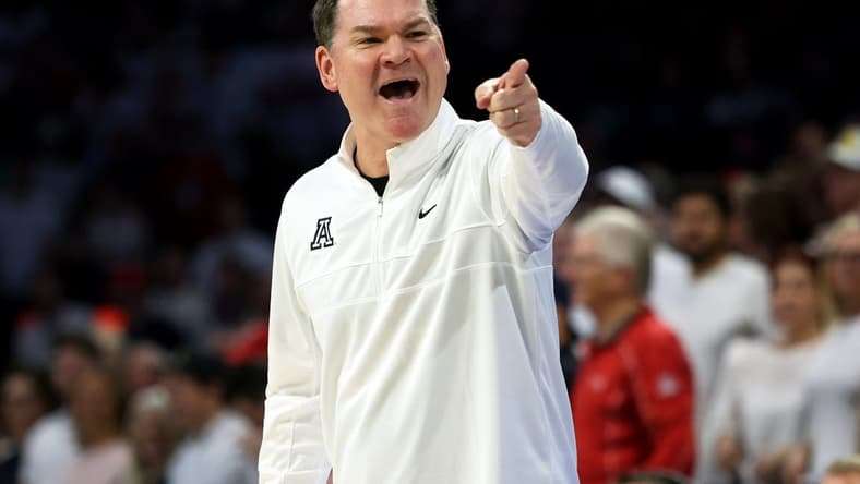 Mar 2, 2024; Tucson, Arizona, USA; Arizona Wildcats head coach Tommy Lloyd on the sidelines against the Oregon Ducks during the first half at McKale Center. Mandatory Credit: Zachary BonDurant-USA TODAY Sports