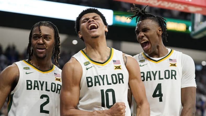 Mar 2, 2024; Waco, Texas, USA; Baylor Bears guard RayJ Dennis (10), guard Jayden Nunn (2), and guard Ja'Kobe Walter (4) react after a made basket and foul against the Kansas Jayhawks during the second half at Paul and Alejandra Foster Pavilion. Mandatory Credit: Raymond Carlin III-USA TODAY Sports