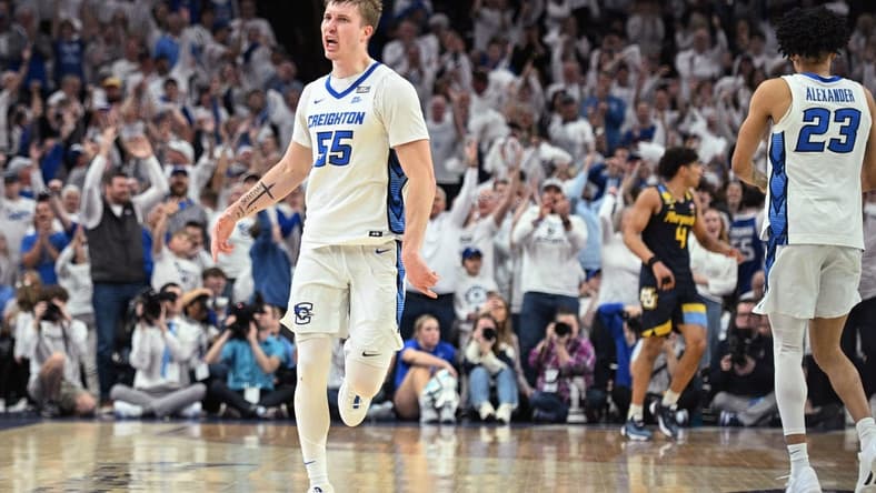 Mar 2, 2024; Omaha, Nebraska, USA; Creighton Bluejays guard Baylor Scheierman (55) celebrates a three point basket against the Marquette Golden Eagles in the second half at CHI Health Center Omaha. Mandatory Credit: Steven Branscombe-USA TODAY Sports