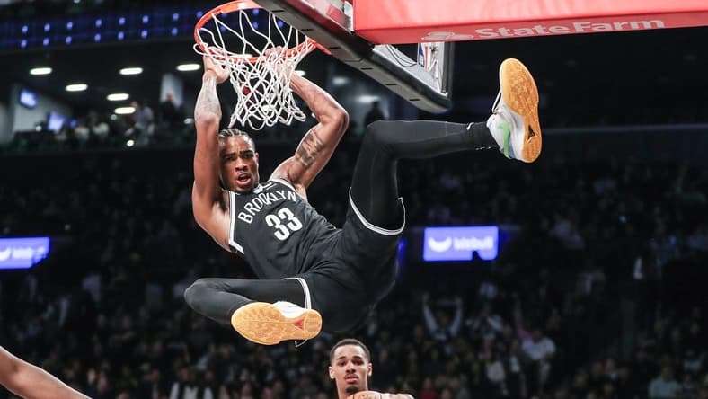 Mar 2, 2024; Brooklyn, New York, USA; Brooklyn Nets center Nic Claxton (33) dunks in the fourth quarter against the Atlanta Hawks at Barclays Center. Mandatory Credit: Wendell Cruz-USA TODAY Sports
