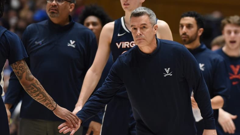 Mar 2, 2024; Durham, North Carolina, USA; Virginia Cavaliers head coach Tony Bennett greets players during a timeout in the first half against the Duke Blue Devils at Cameron Indoor Stadium. Mandatory Credit: Rob Kinnan-USA TODAY Sports