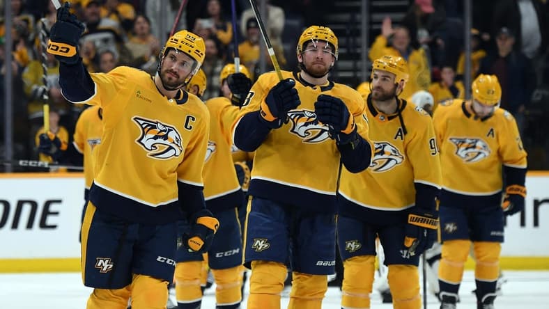 Mar 2, 2024; Nashville, Tennessee, USA; Nashville Predators defenseman Roman Josi (59) celebrates with teammates after a win against the Colorado Avalanche at Bridgestone Arena. Mandatory Credit: Christopher Hanewinckel-USA TODAY Sports