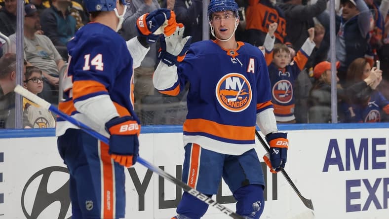 Mar 2, 2024; Elmont, New York, USA; New York Islanders center Brock Nelson (29) celebrates his goal against the Boston Bruins with center Bo Horvat (14) during the second period at UBS Arena. Mandatory Credit: Brad Penner-USA TODAY Sports