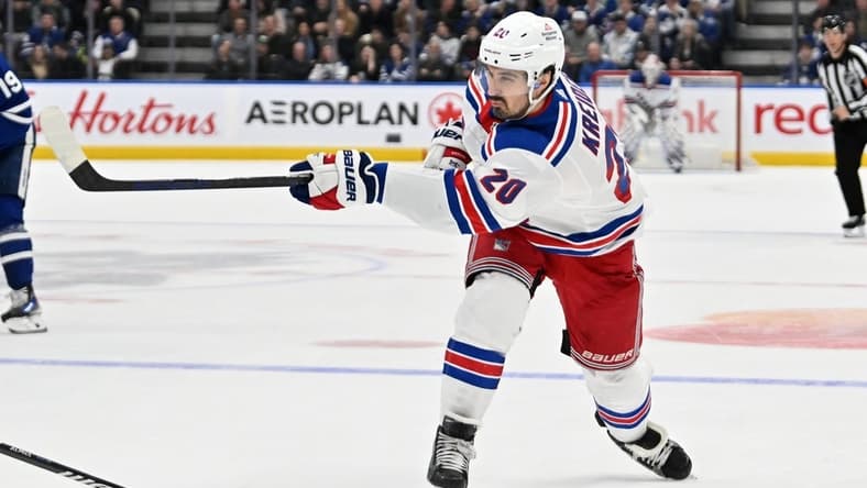 Mar 2, 2024; Toronto, Ontario, CAN; New York Rangers forward Chris Kreider (20) shoots the puck against the Toronto Maple Leafs in the second period at Scotiabank Arena. Mandatory Credit: Dan Hamilton-USA TODAY Sports