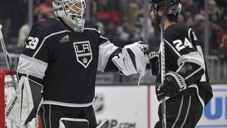 Mar 3, 2024; Los Angeles, California, USA; Los Angeles Kings center Phillip Danault (24) is congratulated by goaltender Cam Talbot (39) after scoring a hat trick in the third period against the New Jersey Devils at Crypto.com Arena. Mandatory Credit: Jayne Kamin-Oncea-USA TODAY Sports