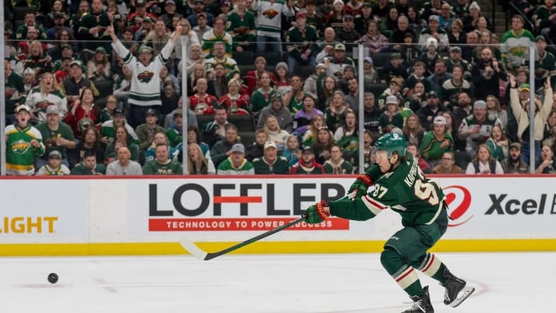 Mar 3, 2024; Saint Paul, Minnesota, USA; Minnesota Wild left wing Kirill Kaprizov (97) shoots and scores against the San Jose Sharks in the second period at Xcel Energy Center. Mandatory Credit: Matt Blewett-USA TODAY Sports