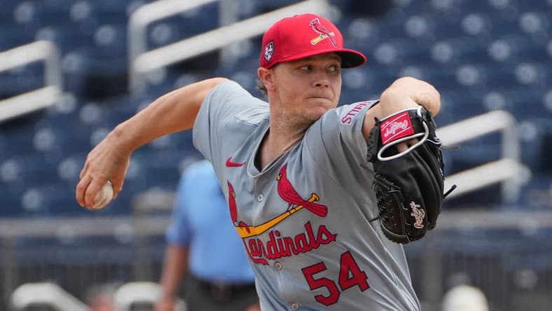Mar 4, 2024; West Palm Beach, Florida, USA;  St. Louis Cardinals starting pitcher Sonny Gray (54) pitches against the Washington Nationals in the first inning at CACTI Ballpark of the Palm Beaches. Mandatory Credit: Jim Rassol-USA TODAY Sports