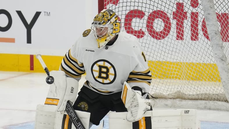 Mar 4, 2024; Toronto, Ontario, CAN; Boston Bruins goaltender Jeremy Swayman (1) makes a save during warm up before a game against the Toronto Maple Leafs at Scotiabank Arena. Mandatory Credit: John E. Sokolowski-USA TODAY Sports