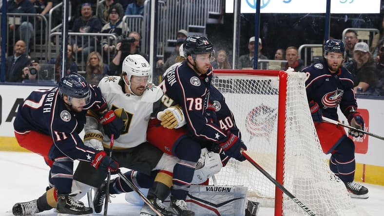 Mar 4, 2024; Columbus, Ohio, USA; Columbus Blue Jackets defenseman Damon Severson (78) clears a loose puck against the Vegas Golden Knights during the first period at Nationwide Arena. Mandatory Credit: Russell LaBounty-USA TODAY Sports