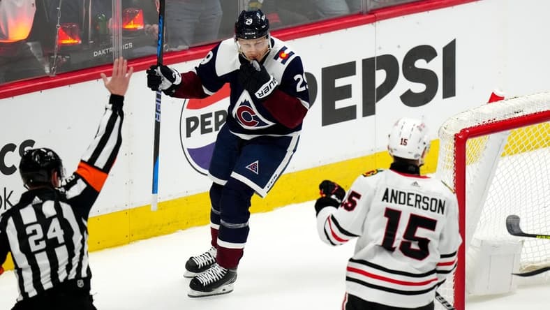 Mar 4, 2024; Denver, Colorado, USA;Colorado Avalanche center Nathan MacKinnon (29) celebrates his his goal during the first period against the Chicago Blackhawks at Ball Arena. Mandatory Credit: Ron Chenoy-USA TODAY Sports