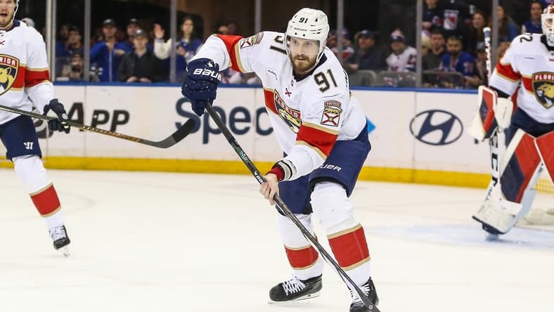 Mar 4, 2024; New York, New York, USA;  Florida Panthers defenseman Oliver Ekman-Larsson (91) controls the puck in the third period against the New York Rangers at Madison Square Garden. Mandatory Credit: Wendell Cruz-USA TODAY Sports