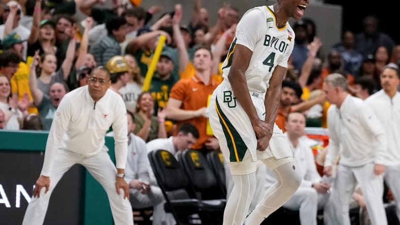 Mar 4, 2024; Waco, Texas, USA; Baylor Bears guard Ja'Kobe Walter (4) reacts after scoring a three point basket against the Texas Longhorns during the second half at Paul and Alejandra Foster Pavilion. Mandatory Credit: Chris Jones-USA TODAY Sports
